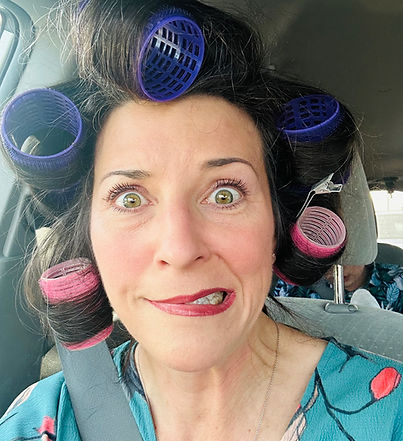 Jen Greenfield with her hair in curlers looking stressed!
